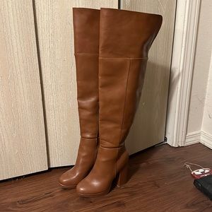 Like new shoe dazzle heeled over the knee boots to small for me.